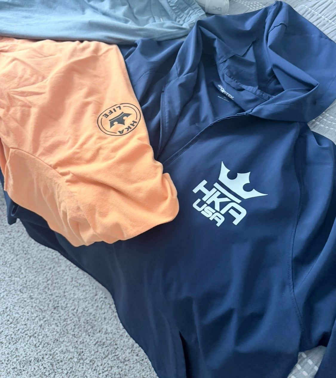 HKA 1/2 Zip Hooded Shell Jacket.